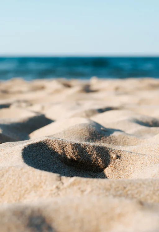 close-up-beach-sunny-summer-day-yellow-sand-and-s-2026-03-24-04-48-09-utc