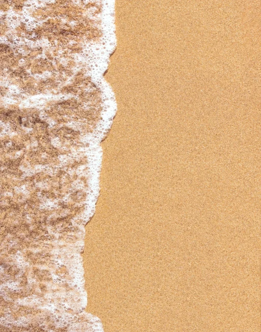 closeup-of-sand-pattern-of-a-beach-in-the-summer-2026-03-19-09-27-47-utc