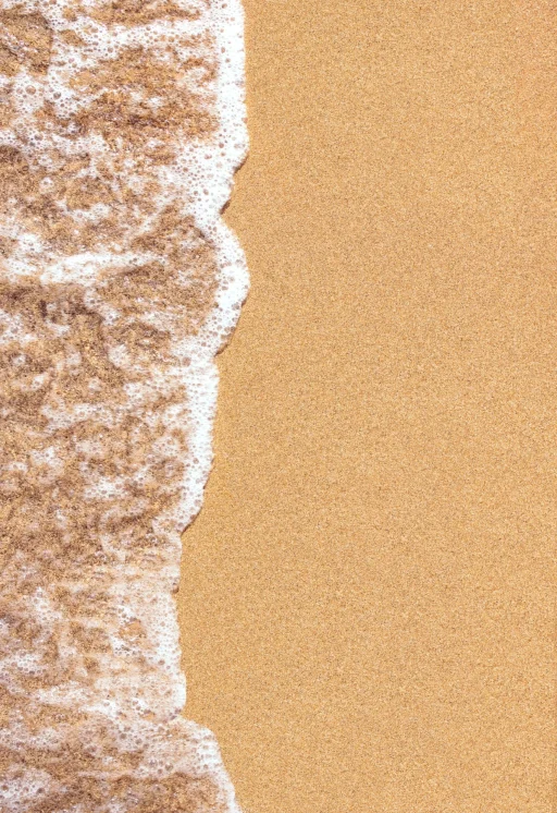 closeup-of-sand-pattern-of-a-beach-in-the-summer-2026-03-19-09-27-47-utc